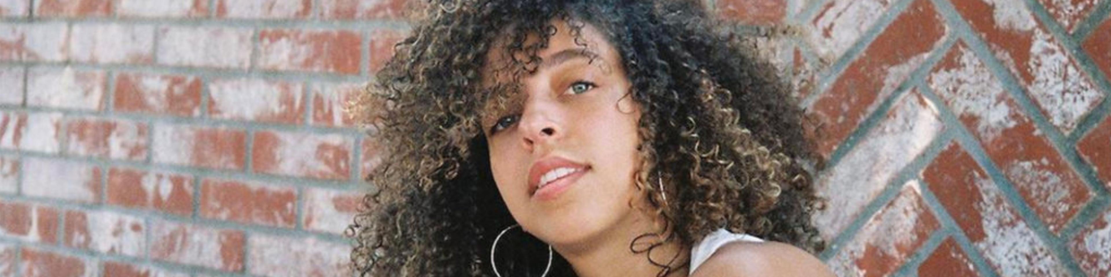 Riverdale’s Hayley Law Reveals Her Favorite Curl Cream – “It’s My Go-To for Keeping Hair Moist”